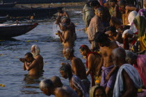 Sivaratri Festival crowds praying and bathing in the River Ganges.Shiva Ratri Asia Asian Bharat Inde Indian Intiya Religion Religious