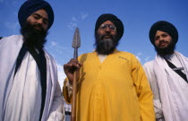 Three-quarter portrait of three of the guardians of the Golden Temple.3 Asia Asian Bharat Inde Indian Intiya Religion Religious