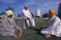 Golden Temple.  Three elderly Sikh men sitting outside the temple complex.3 Asia Asian Bharat Inde Indian Intiya Male Man Guy Old Senior Aged Religion Religion Religious Sihism Sikhs
