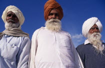 Three elderly Sikh men  head and shoulders portrait from low angle looking up3 Asia Asian Bharat Inde Indian Intiya Male Man Guy Old Senior Aged Religion Religion Religious Sihism Sikhs