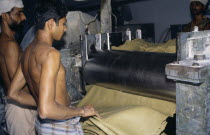 Workers in rubber factory.Asia Asian Bharat Inde Indian Intiya Kerela