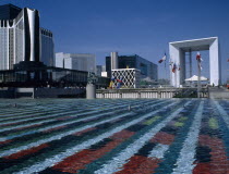 La Defence.  La Grande Arche seen from across colourful abstract water poolColorful Defense European French Western Europe