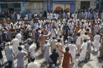 Mohurrum Festival.  Men beating their chests durring Shia muslim festival of mourning to commemorate the death of Husayn ibn Ali  grandson of Muhammad.Muharram  Mohurram Asia Asian Islam Male Man Guy...