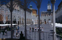 Central square or piazza  surrounded by ornate metal work  view from band stand