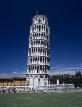 The Leaning Tower with barriers around base while restoration work is carried out and visitors in surrounding area. Italia Italian Religion Southern Europe Toscana Tuscan