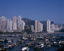 View over the busy harbour toward the city skyline beyond