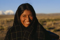 Quecha shepherdess smiling near La Paz
