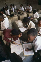 Schoolchildren in classroom.