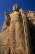 Twelve metre high standing Buddha believed to have been sculpted during the reign of Dhatusena in the 5th century AD.  Asia Asian Llankai Meter Religion Sri Lankan