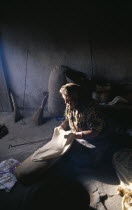 Woman making traditional bread called lavash.
