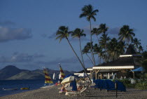 View along beach with sails and sunbeds beside beach bars of the Four Seasons Hotel4 Beaches Caribbean Resort Sand Sandy Seaside Shore Tourism West Indies