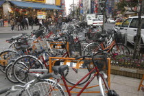 Outside Shinjuku station  bicycles clutter the pavementbikes Asia Asian Japanese Nihon Nippon