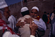 Devout Muslims saying their goodbyes before departing on pilgrimage to Mecca.Asia Asian Pakistani Religion Religious
