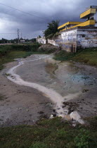 Area of water polluted by nearby dye factory.