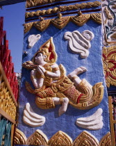 Wat Chayamangkalaram also known as Wat Buppharam   large Thai temple.  Detail of carving depicting Sita figure from the Ramakien Thai National epic.Asian Malaysian Religion Religious Southeast Asia