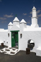 La Casa Museo a La Campesino or the Farmhouse Museum.  Green painted entrance gate to white painted museum complex.Espainia Espana Espanha Espanya European Hispanic Southern Europe Spanish