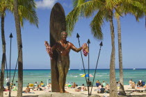 Duke Kahanamokus statue on Central Waikiki BeachAmerican North America Pacific Islands Polynesia United States of America Many Islands Polynesian Beaches Resort Sand Sandy Seaside Shore Sunbather Tou...