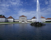 Nymphenberg Palace. Ornamental lake with rock fountain and tall water spout