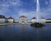 Nymphenberg Palace. Ornamental lake with rock fountain and tall water spout