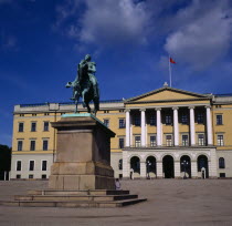 Royal Palace exterior with statue in foreground