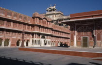 City Palace.  he seven storey Chandra Mahal overlooking courtyard arround the Diwan-i-Khas on the left.  Presence of the Maharaja is indicated by the flag flying above.