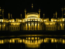 The Royal Pavilion illuminated at night with reflection in pondEuropean Great Britain Nite Northern Europe Reflexion UK United Kingdom British Isles Pavillion