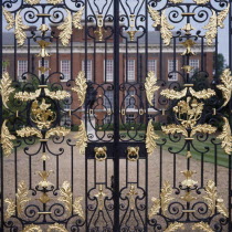 Kensington Palace with gate details in front