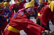 An accompanying performer in the Dragon dance at the end of Chinese New Year in ChinatownAsian Prathet Thai Raja Anachakra Thai Religion Siam Southeast Asia Religious Siamese