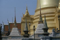 Aka Wat Phra Kaeo. Exterior view of golden architecture and spires Prathet Thai Raja Anachakra Thai Religion Siam Southeast Asia Asian Religious Siamese