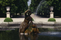 Schonbrunn Palace Gardens.  Statue and fountain in pool.