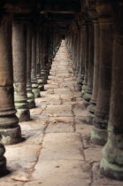 Colonnaded pathway beneath causeway to the Baphuon inside the Royal Palace.Asian Cambodian History Kampuchea Southeast Asia Kamphuchea
