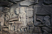 The Bayon.  Bas relief carvings on the south wall depicting everyday scenes.  Fishmarket.Asian Cambodian Kampuchea Southeast Asia History Kamphuchea