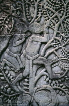 Bayon.  Bas relief carvings on the south wall depicting everyday scenes.  Hunting with blowpipes.Asian Cambodian History Kampuchea Southeast Asia Kamphuchea