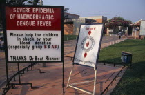 Sign outside the Childrens Hospital asking for blood donations due to a severe epidemic of haemorragic dengue feverAsian Cambodian Kampuchea Kids Southeast Asia Kamphuchea
