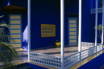 The Jardin Majorelle owned by Yves St Laurent.  Corner of balcony with walls painted vivid blue.