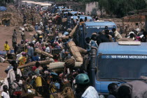 UN trucks picking up huge numbers of refugees fleeing civil war.United Nations  displaced people  African Burundian Eastern Africa Uburundi