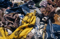 Local dyed and printed fabrics for sale in market.African Senegalese