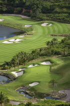 Raffles Resort Trump International Golf Course designed by Jim Fazio. The 16th green which is the longest par 3 in the world and the 17th fairway