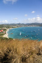 Beach lined Rodney Bay with yachts at anchor seen from Signal Hill on Pigeon Island National Historic Park