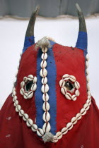Detail of horned mask of magician s costume decorated with cowrie shells exhibited at the National Museum of the Gambia.AfricancultbeliefsuperstitionspiritcultureshamanGambian Religion Western...