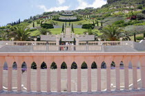Zionism Avenue.  View of Bahai gardens built as memorial to founders of the Baha i faith.  Colonnaded balcony in foreground with view across tiered gardens stretching out beyond.sanctuarypilgimages...