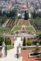 Zionism Avenue.  View of Bahai Shrine and Gardens.  Tiered formal gardens with palms  cypress trees and central domed shrine with city part seen beyond.sanctuarypilgimagesacredreligionmonothesist...