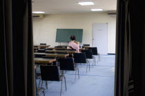 Gion District  the neighbourhood where Geisha live  study and perform.  Geisha practicing her Japanese flute skills in an empty classroom at the Mia Garatso school for Geisha.Far EastGeikolearning...