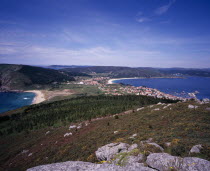 View north from Cap Fisterra with Praia do Mar de Fora on the left and the village of Fisterra on the right.