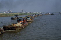 Barge train travelling down the Grand Canal between Suzhou and Wuxi. Asia Asian Chinese Chungkuo Jhonggu Zhonggu Traveling