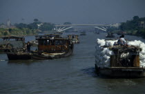 Barges travelling down the Grand Canal between Suzhou and Wuxi. Asia Asian Chinese Chungkuo Jhonggu Zhonggu Traveling