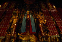 Jade Buddha Temple interior with statue of standing Buddha draped in silk cloak Asia Asian Chinese Chungkuo Jhonggu Zhonggu Religious