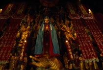 Jade Buddha Temple interior with statue of standing Buddha draped in silk cloak Asia Asian Chinese Chungkuo Jhonggu Zhonggu Religious