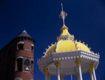 Victoria Square.  Detail of yellow and white canopy of the Jaffe Memorial Fountain  constructed in 1874 with top of the brick exterior facade of Bittles Bar behind.nineteenth century 19th c Bal Feir...