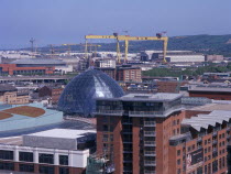 Cityscape with Victoria Square shopping centre dome and cranes seen from The Belfast Wheel at City Hall.Bal Feirste Center Eire European Irish Northern Europe Republic Ireland Poblacht na hireann